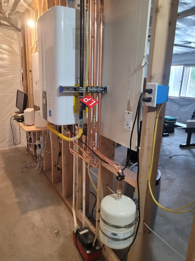 Licensed plumber repairing a kitchen sink in Unalaska